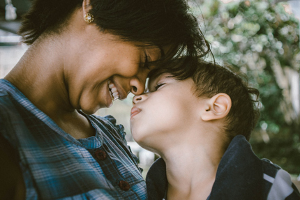 Mother and daughter warmly embracing