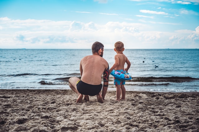 Father with his child at the beach