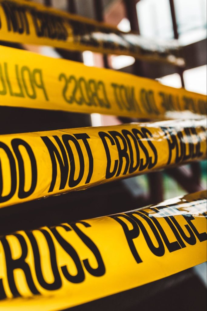 Yellow police tape at a crime scene